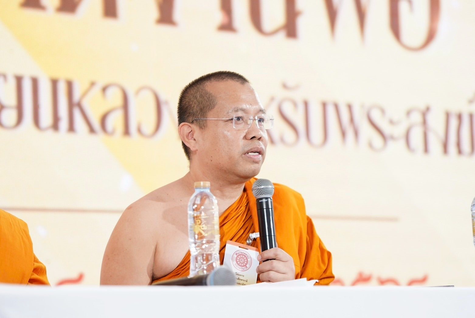 พระอุดมบัณฑิต (สีไม้)